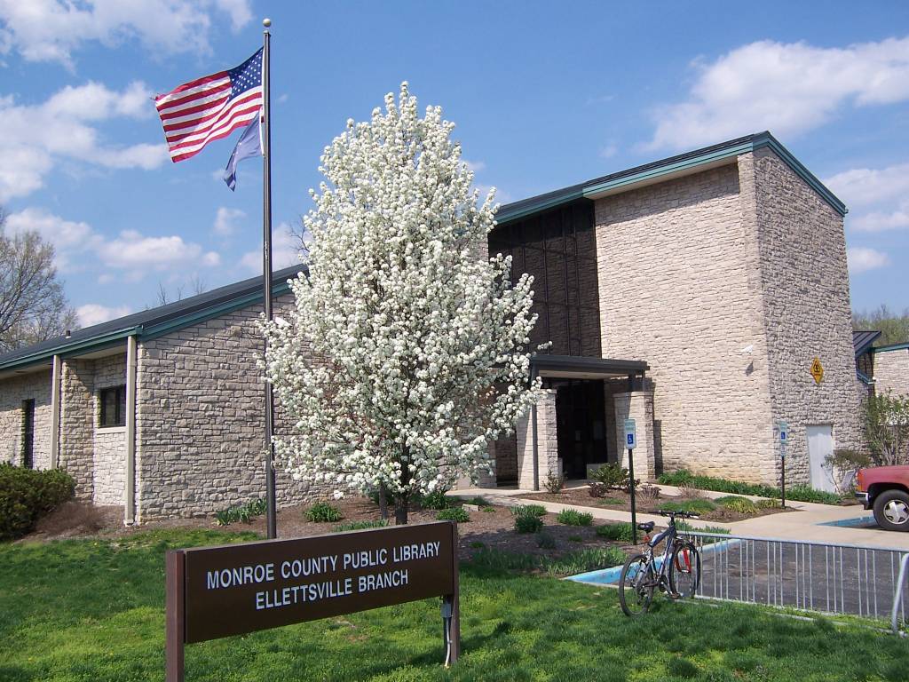 Ellettsville Library with tree out front in bloom