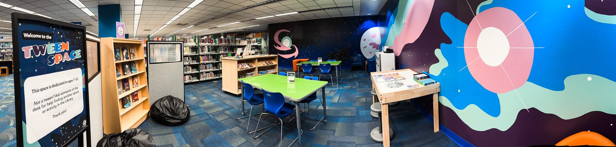 image of Tween Space with night sky cosmos graphics on the wall